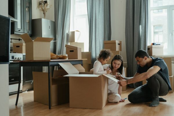 family unpacking after moving